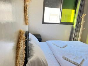 Letto o letti in una camera di Sun Set Surf House Imsouane