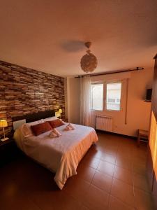 Ένα ή περισσότερα κρεβάτια σε δωμάτιο στο Faro de Ajo