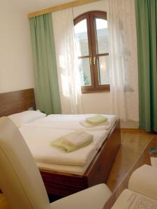 Letto o letti in una camera di Winzerhof Michael Gartner