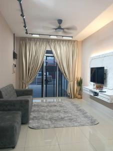 Μια τηλεόραση ή/και κέντρο ψυχαγωγίας στο Adia's homestay jengka