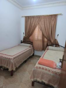 Un pat sau paturi într-o cameră la Piso