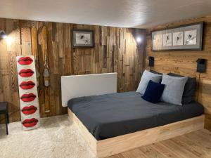 Ένα ή περισσότερα κρεβάτια σε δωμάτιο στο Le Chalet 138 Megève appartement pour 8