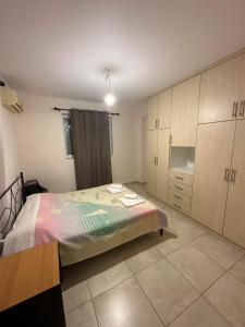 Posteľ alebo postele v izbe v ubytovaní Green House Messini