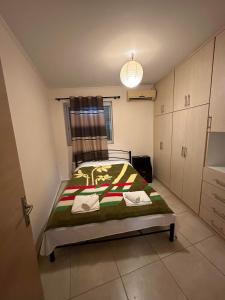 Postel nebo postele na pokoji v ubytování Green House Messini