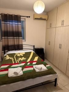 Posteľ alebo postele v izbe v ubytovaní Green House Messini