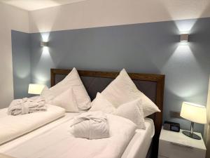 Ein Bett oder Betten in einem Zimmer der Unterkunft 4-Sterne Premiumferienwohnung  Köhnke 3 - [#122258]