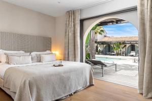 Кровать или кровати в номере Villa Cosy, hotel & spa