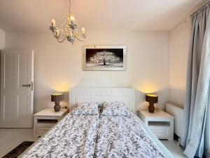 Posteľ alebo postele v izbe v ubytovaní Ann Apartament Gdańsk