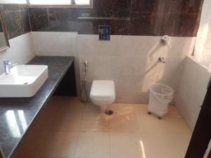 Koupelna v ubytování Hotel Orchid Garden Karol Bagh