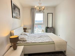 Posteľ alebo postele v izbe v ubytovaní Ann Apartament Gdańsk