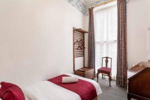 Postel nebo postele na pokoji v ubytování St Athans Hotel