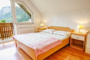 Katil atau katil-katil dalam bilik di Apartments Kovačič