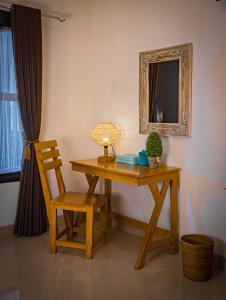 Imagen de la galería de Deni Guesthouse, en Tanah Lot