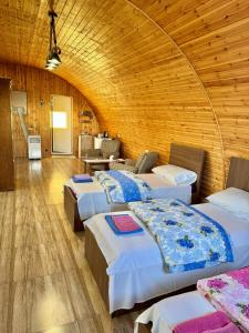 Postel nebo postele na pokoji v ubytování Guest House AMO