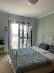 Posteľ alebo postele v izbe v ubytovaní Modern apartment in Caleta de Fuste 60m² with shared pool + 12 fotografií