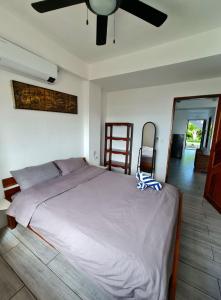Postel nebo postele na pokoji v ubytování Tablas Seaview Homestay + 37 fotografií