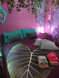 A bed or beds in a room at MAISONETTE Fata Bislacca, calcata