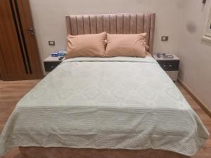 Postel nebo postele na pokoji v ubytování Duplex