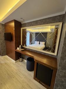 Postel nebo postele na pokoji v ubytování Sultan city hotel