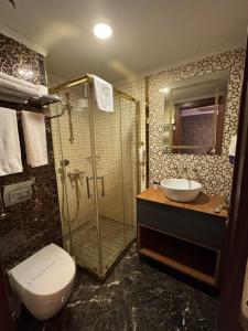 Koupelna v ubytování Sultan city hotel