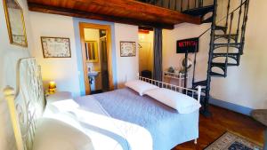 Postel nebo postele na pokoji v ubytování Casa Il Borghetto - Luxury Suites & Pool