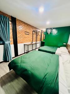 Postel nebo postele na pokoji v ubytování Big Dreams Hotel