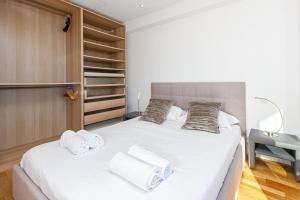 Postel nebo postele na pokoji v ubytování Joli appartement rénové - Lumineux - Vue mer - CQ