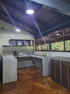 Kuchyň nebo kuchyňský kout v ubytování Ávita Lodge