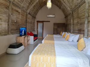 Grand Daghan Cottage 객실 침대