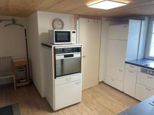 Kuchyň nebo kuchyňský kout v ubytování Bijou 2 hübsche 1 Zimmer Wohnung