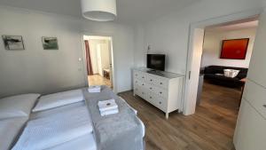 TV a/nebo společenská místnost v ubytování Gästewohnung Schlossblick