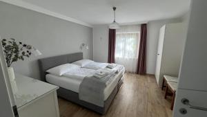 Postel nebo postele na pokoji v ubytování Gästewohnung Schlossblick