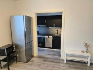 Η κουζίνα ή μικρή κουζίνα στο M&J Apartments Rajakatu +11 φωτογραφίες