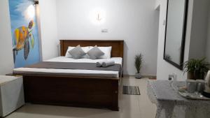 Letto o letti in una camera di TaMaRiNd house