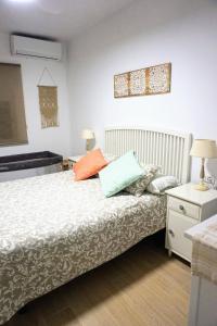 Postel nebo postele na pokoji v ubytování Villa Horacia