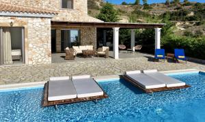 Bazén v ubytování Villa Kalypso Infinity Pool Villa nebo v jeho okolí