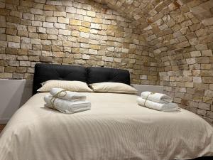 Postel nebo postele na pokoji v ubytování B&B Bari Vecchia R