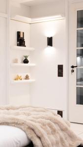 Ένα ή περισσότερα κρεβάτια σε δωμάτιο στο Black & White Suite & SPA - Sauna & Jacuzzi +11 φωτογραφίες