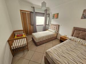 Voodi või voodid majutusasutuse Appartement Al Amal toas