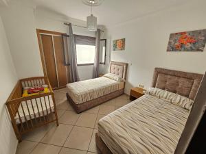 Voodi või voodid majutusasutuse Appartement Al Amal toas