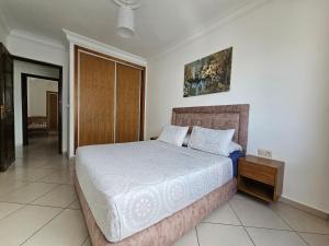 Voodi või voodid majutusasutuse Appartement Al Amal toas