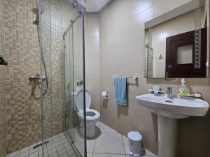 Vannituba majutusasutuses Appartement Al Amal