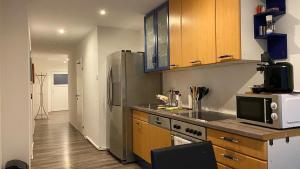 Η κουζίνα ή μικρή κουζίνα στο DC Room Johannes