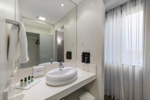 Um banheiro em Staybridge Suites São Paulo by IHG