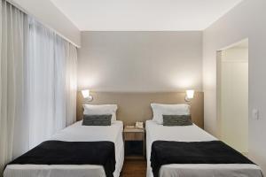 Cama ou camas em um quarto em Staybridge Suites São Paulo by IHG