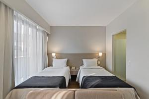 Cama ou camas em um quarto em Staybridge Suites São Paulo by IHG