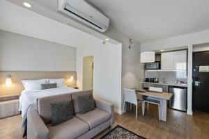 A cozinha ou cozinha compacta de Staybridge Suites São Paulo by IHG