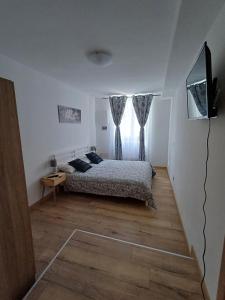 TV a/nebo společenská místnost v ubytování Monica's home