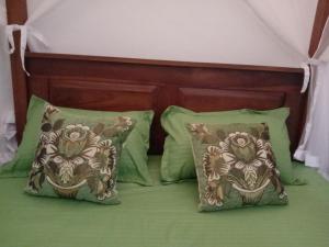 Postel nebo postele na pokoji v ubytování Padumaweera Holiday Inn