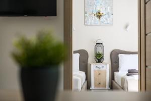 Postel nebo postele na pokoji v ubytování Lagūna - Šventoji